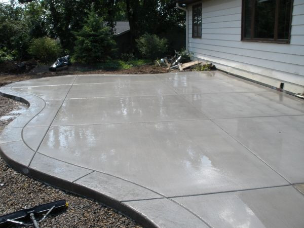 Concreting Backyard Cost
 Concrete patio with stamped border