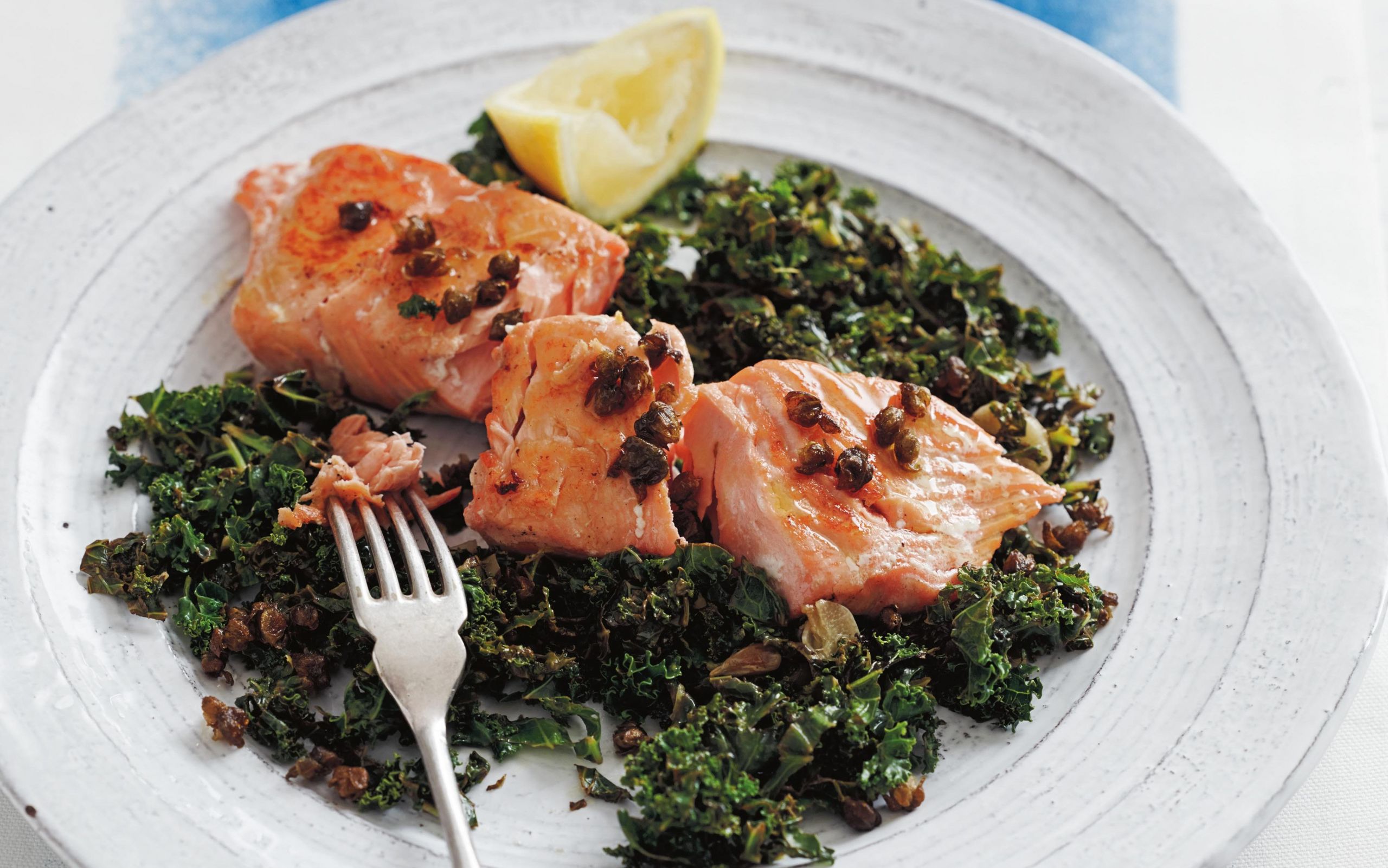 Salmon And Kale Recipes
 Salmon with sautéed kale and too many capers recipe