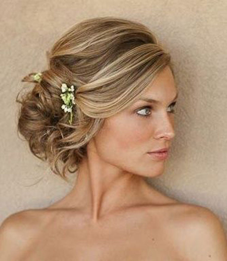 Wedding Hairstyle Side Bun
 From messy hair to loose curls Wedding hairdos for the