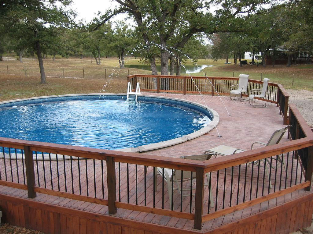 Above Ground Pool Deck Ideas
 Ground Pool Deck Jets and Dark Blue Liner LaVernia