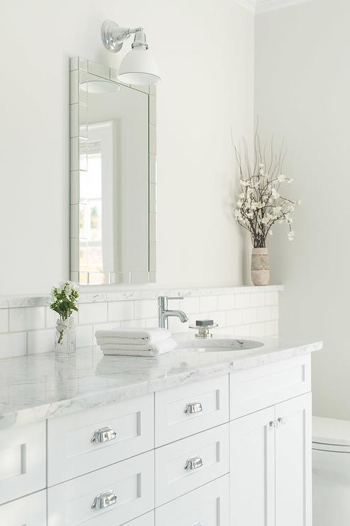 Bathroom Vanity Backsplash
 White Bathroom with Marble Backsplash Ledge Transitional