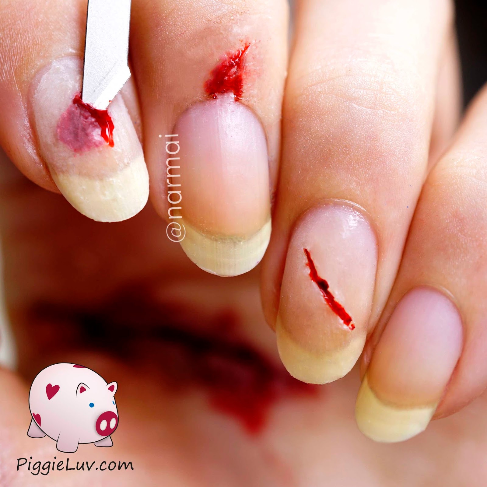 Bloody Nail Art
 PiggieLuv Bloody razor cuts nail art for Halloween
