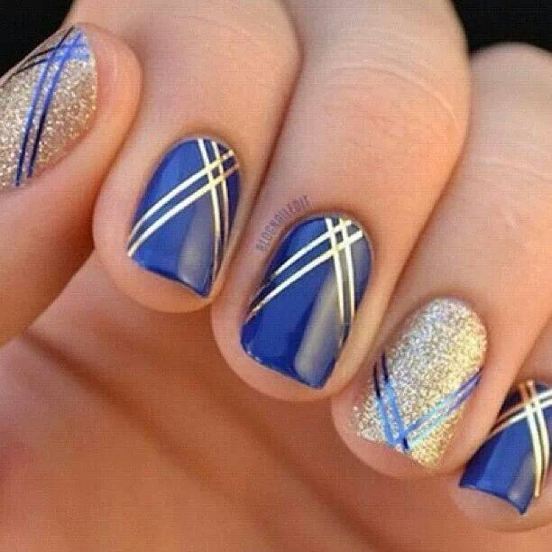 Blue And Gold Nail Art
 Cute blue and gold nails
