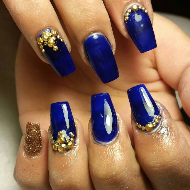 Blue And Gold Nail Art
 Experience the Glamorous Style of Royal Blue Nail Designs