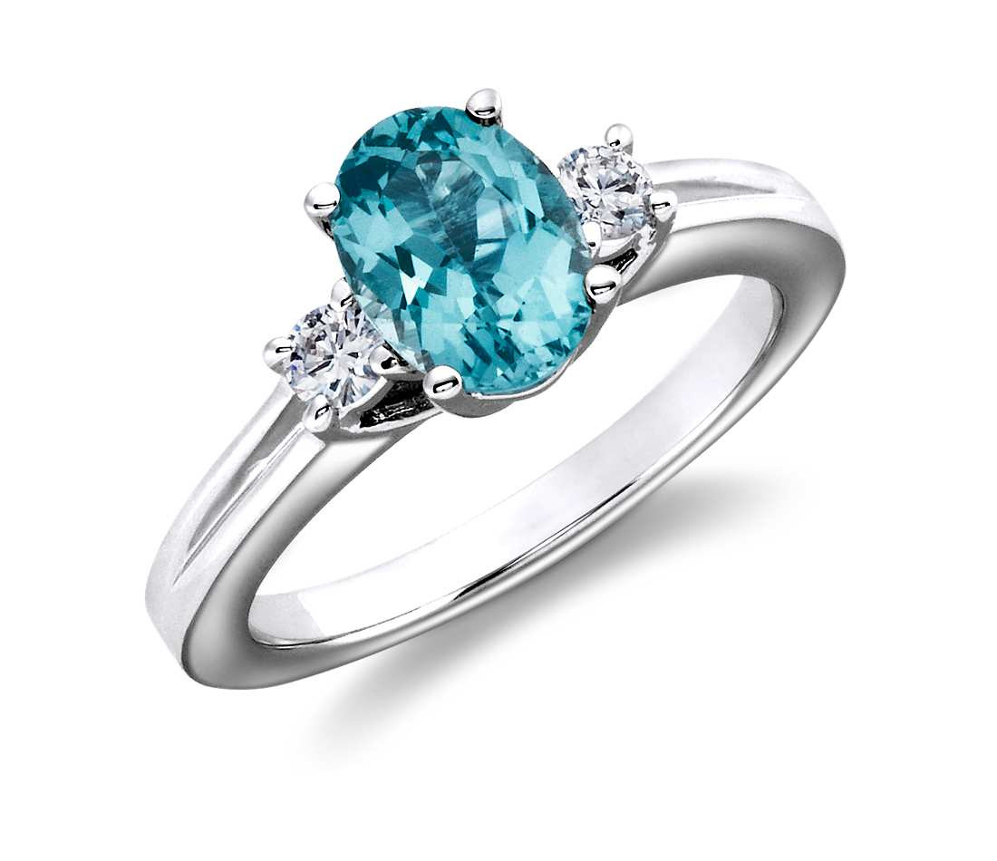 Blue Diamonds Rings
 Blue Topaz and Diamond Ring in 18k White Gold 8x6mm