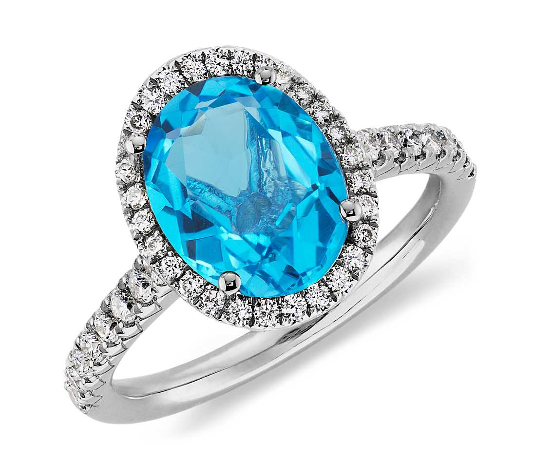 Blue Diamonds Rings
 Blue Topaz and Diamond Ring in 18k White Gold 10x8mm