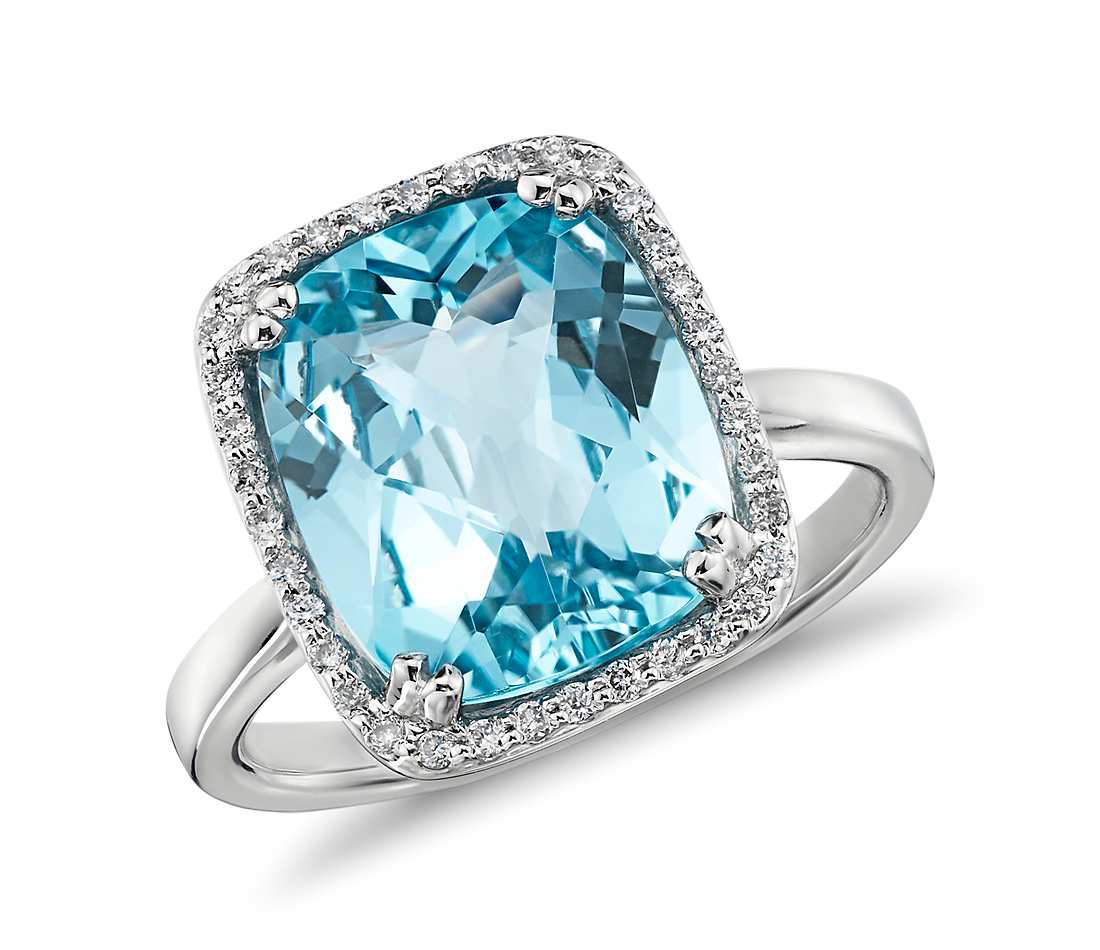 Blue Diamonds Rings
 Sky Blue Topaz and Diamond Halo Cushion Cut Ring in 14k
