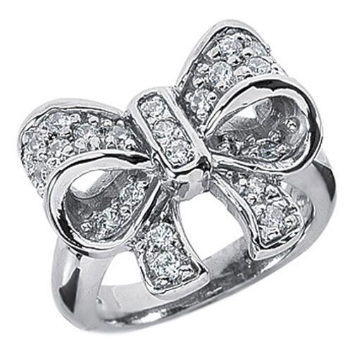 Bow Wedding Ring
 Diamond Bow Ring in 14 Karat White Gold I want a bow