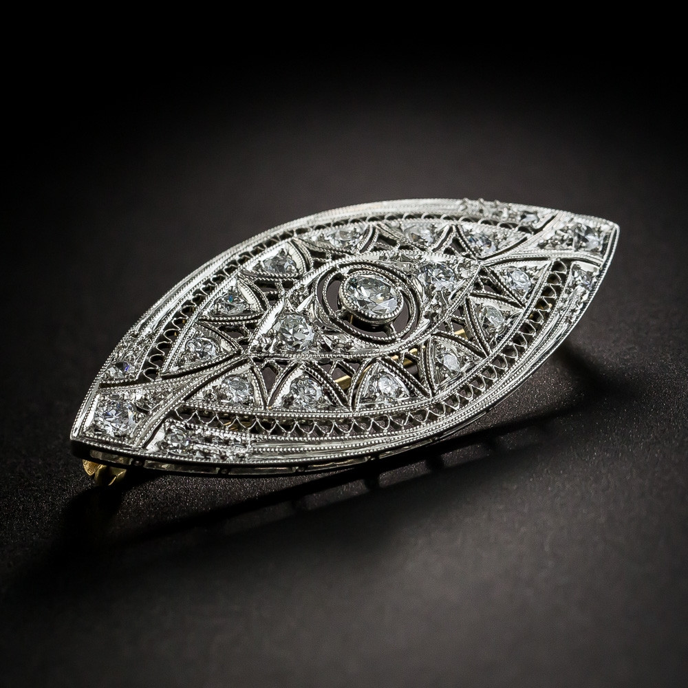 Brooches Art
 Early Art Deco Platinum Diamond Brooch