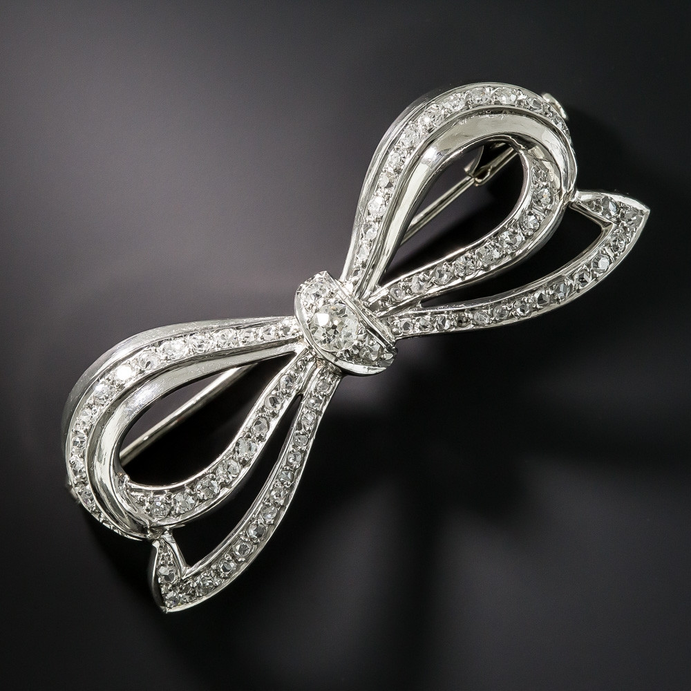 Brooches Art
 French Platinum Diamond Art Deco Bow Brooch