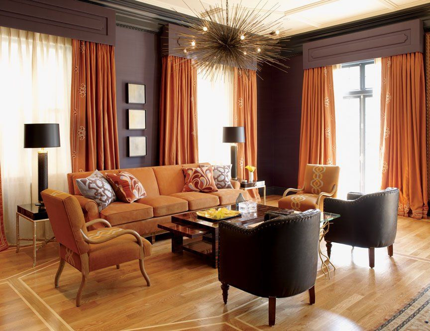 Burnt Orange Living Room Ideas
 Burnt orange and chocolate brown infuse this room with