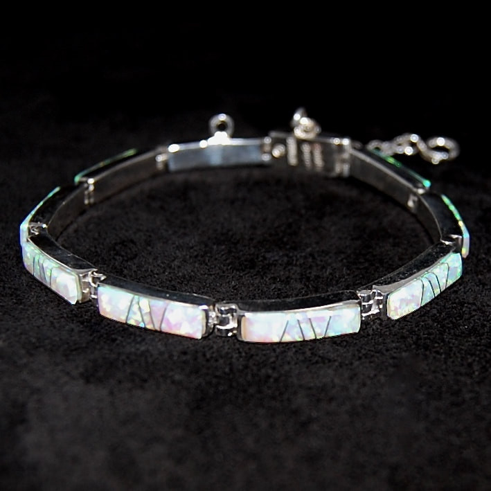 Calvin Begay Bracelets
 Calvin Be Navajo Silver link bracelet Lab Opal