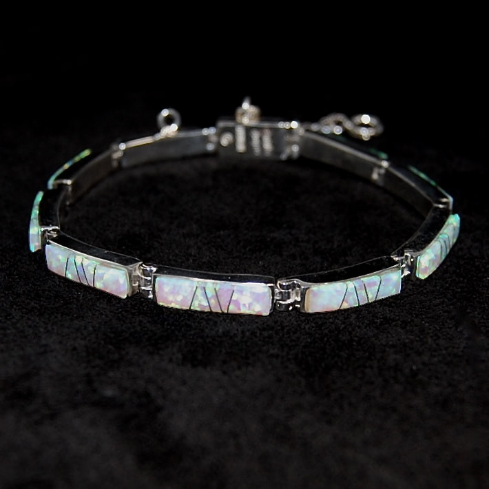 Calvin Begay Bracelets
 Calvin Be Navajo Silver link bracelet Lab Opal