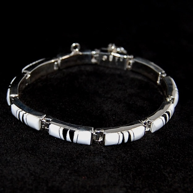 Calvin Begay Bracelets
 Calvin Be Navajo Silver link bracelet White Buffalo