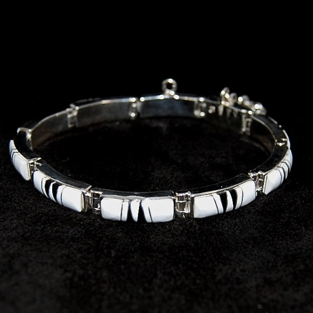 Calvin Begay Bracelets
 Calvin Be Navajo Silver link bracelet White Buffalo