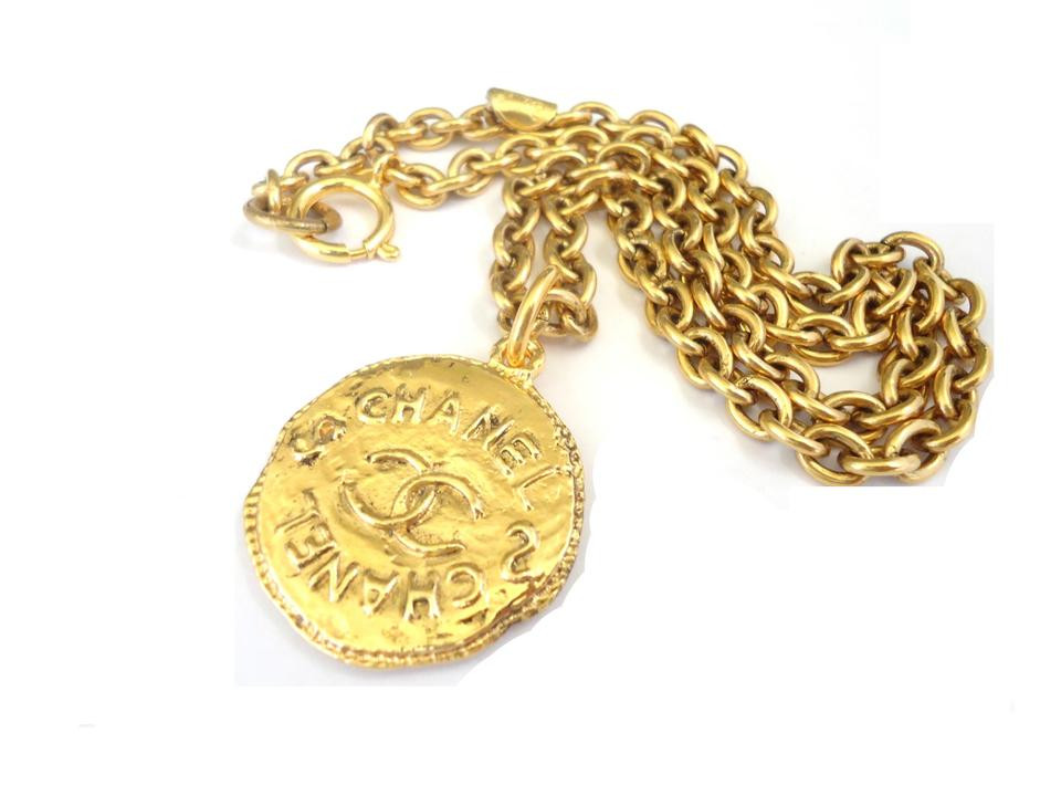 Chanel Pendant Necklace
 Chanel Double Sided Coin Pendant Choker Gold Color Cc