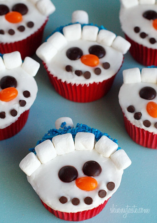 Christmas Cakes For Kids
 Vanilla Snowman Cupcakes with Vanilla Icing