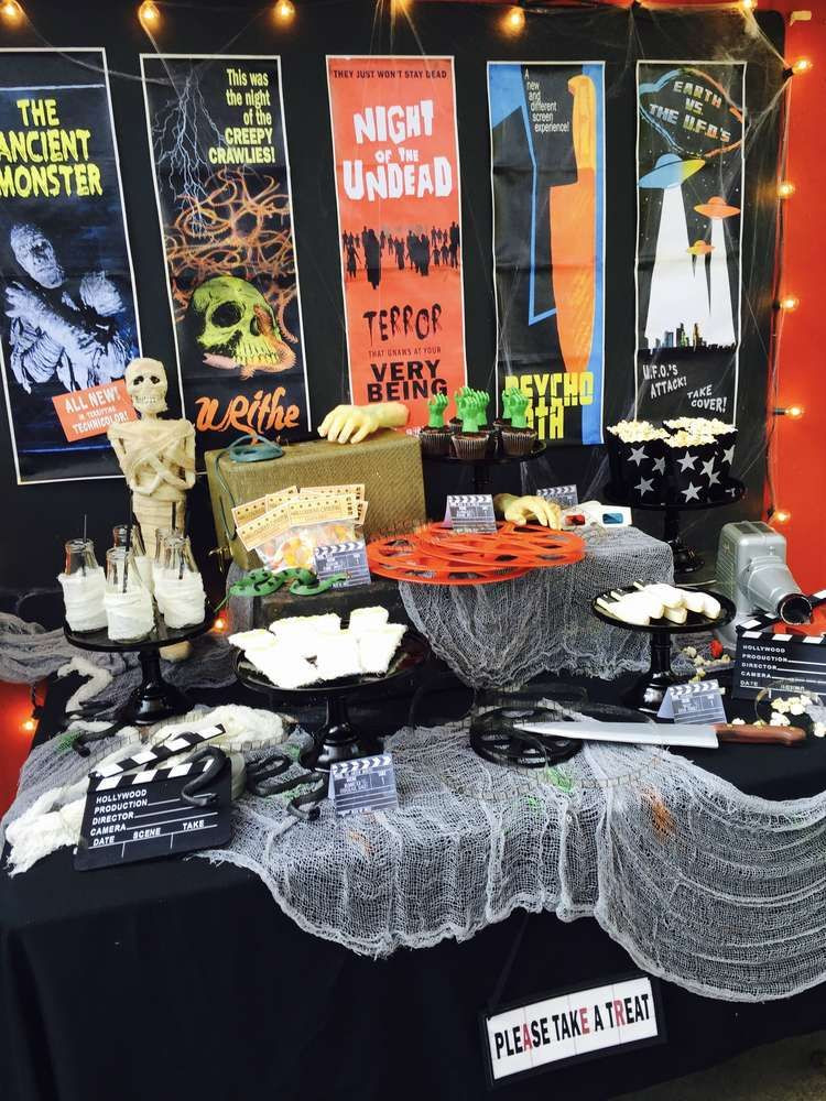 Classic Halloween Party Ideas
 Dessert table at a vintage horror movie Halloween party
