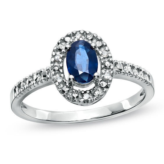 Diamond Engagement Ring With Sapphire Accents
 Oval Blue Sapphire and Diamond Accent Framed Engagement