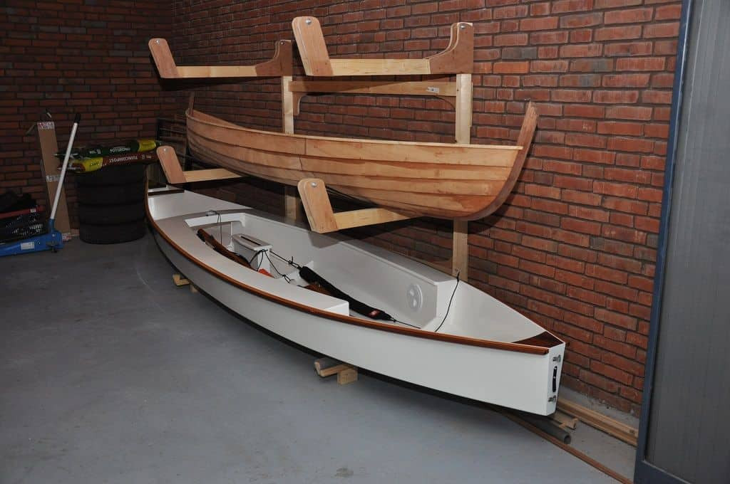 DIY Kayak Wall Rack
 Build a Triple Canoe Storage Boat Rack for Kayaks and SUPs Storer Boat Plans in Wood and Plywood