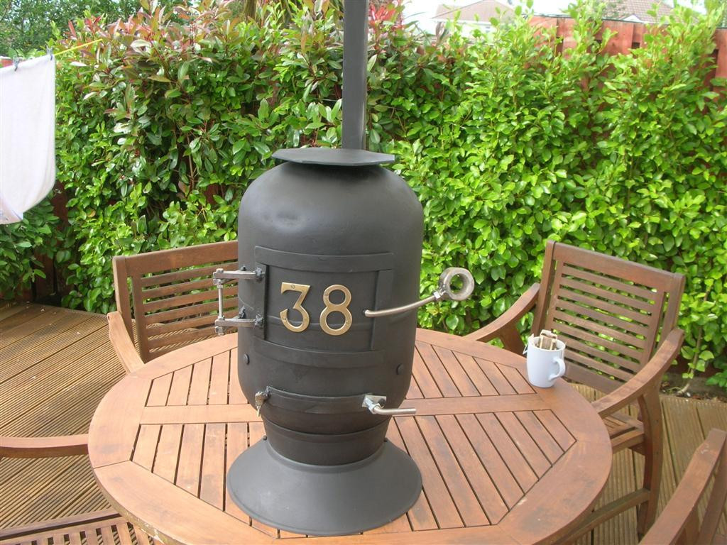 DIY Outdoor Heater
 Wood stove made from scrap
