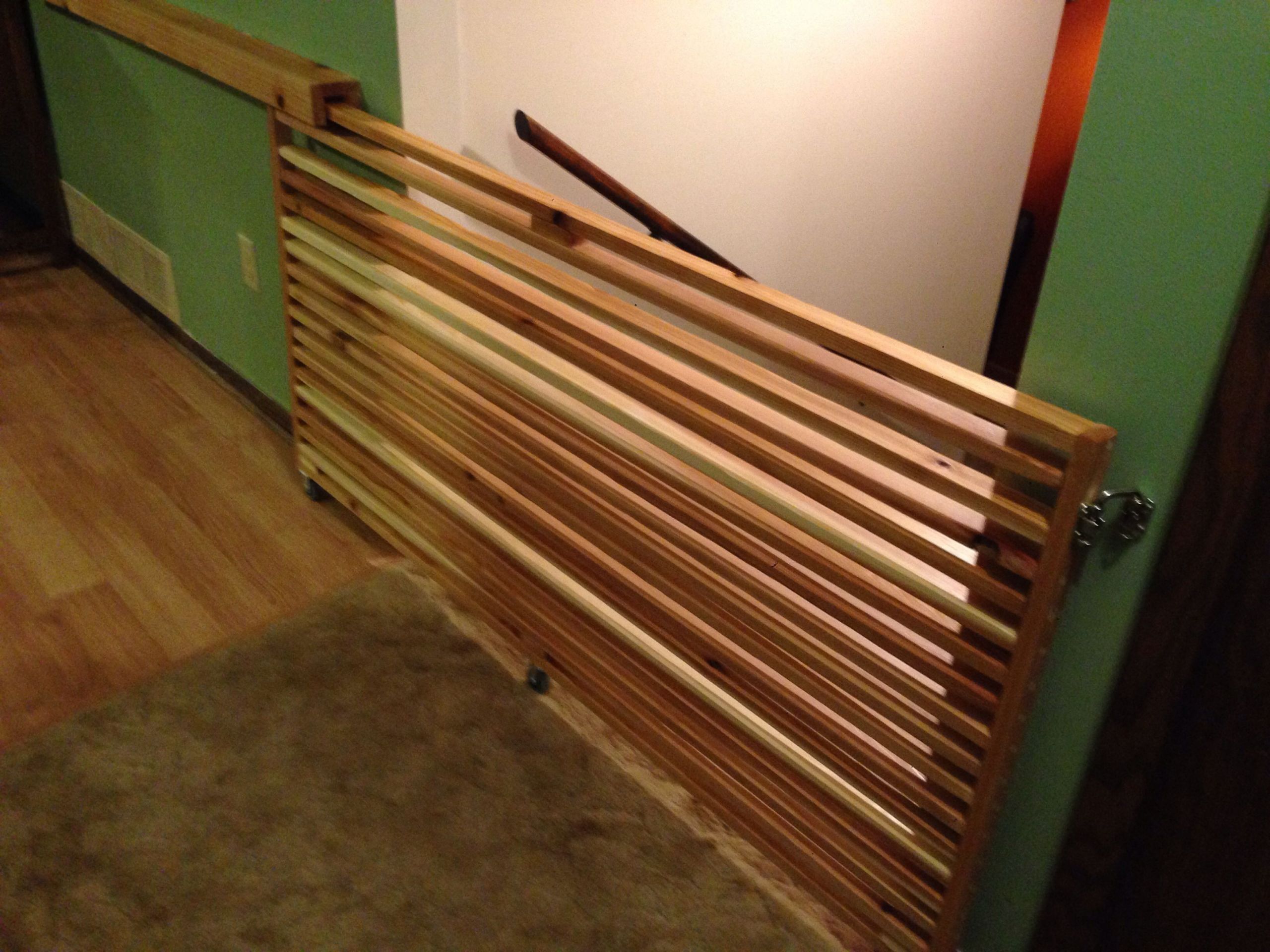 DIY Sliding Baby Gate
 Sliding gate for the top of stairs Made of cedar 1x2