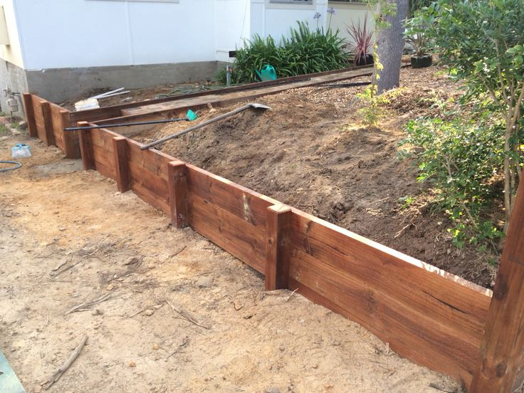 DIY Wood Retaining Wall
 DIY timber retaining wall in the making Treated pine