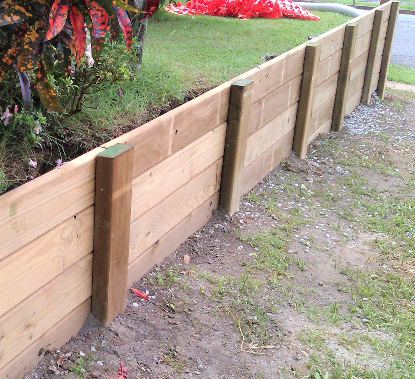 DIY Wood Retaining Wall
 How to Build a Wood Retaining Wall