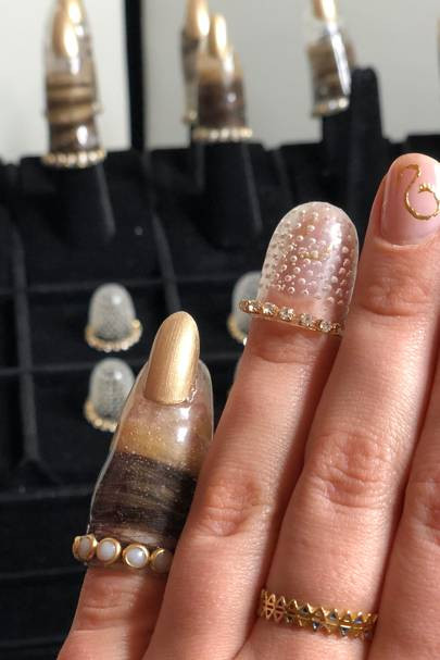 Encapsulated Nail Art
 Encapsulated Nail Art Hair Encased In Nails At NYFW