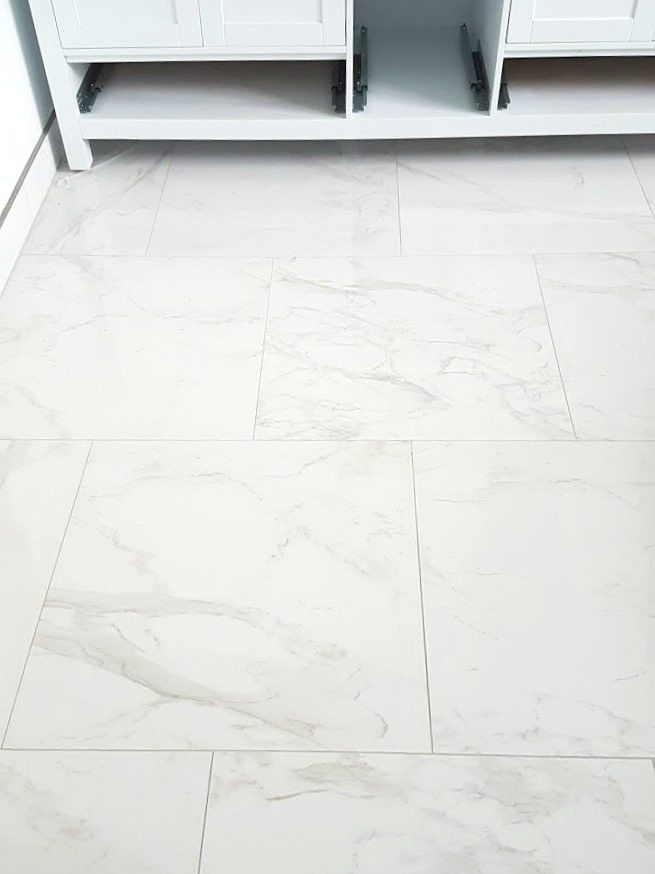 Faux Marble Tile Bathroom
 Choosing faux Carrara Marble Floor Tile for the Bathroom