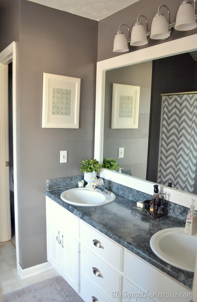 Framed Mirror In Bathroom
 How to frame out that builder basic bathroom mirror for