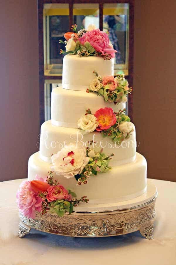 Fresh Flowers On Wedding Cake
 White Wedding Cake with Cascading Fresh Flowers