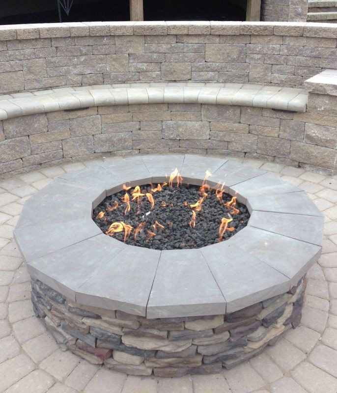 Gas Stone Fire Pit
 Gas firepit with stone veneer and natural stone caps
