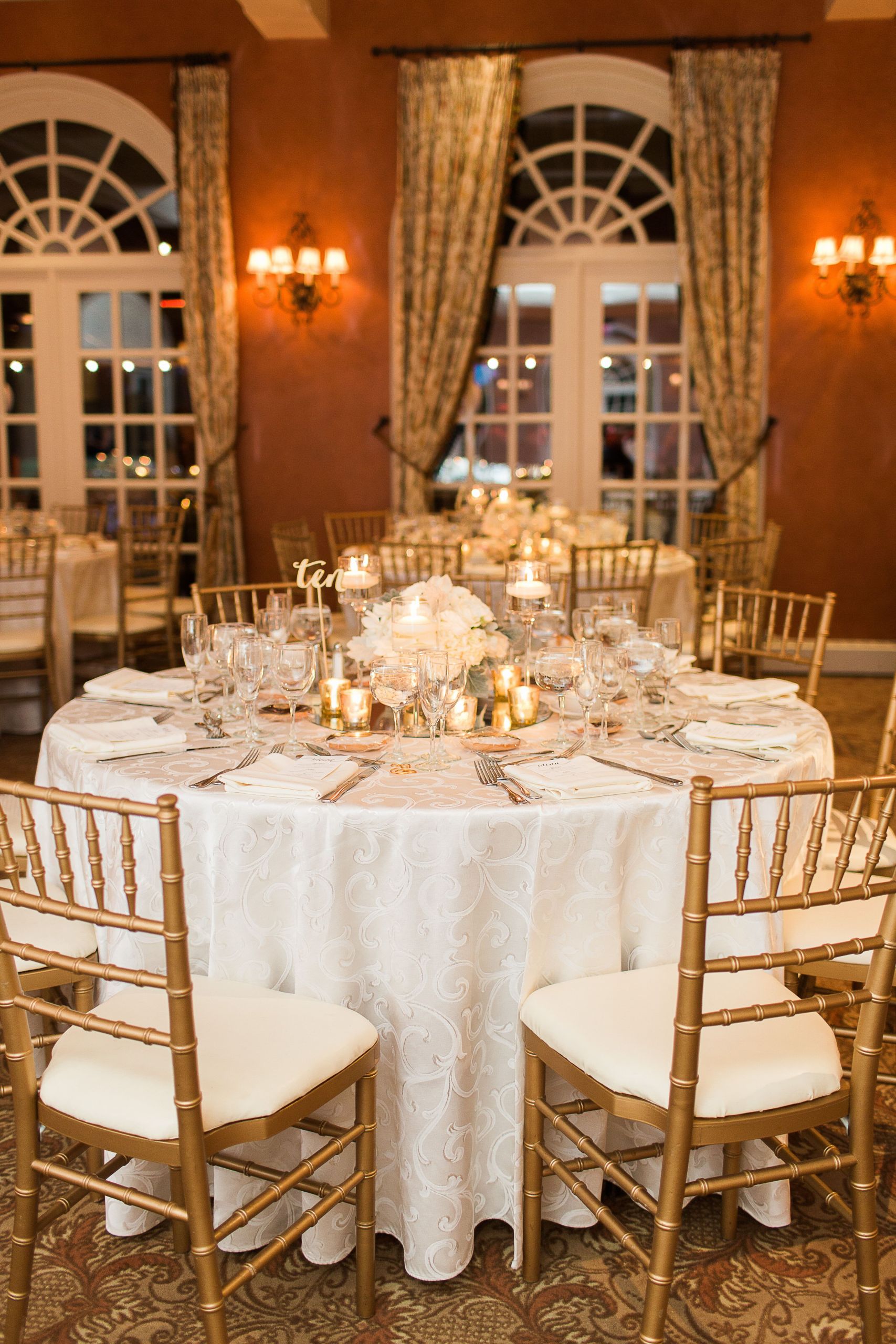 Gold And White Wedding Decor
 Gold and White Round Reception Table