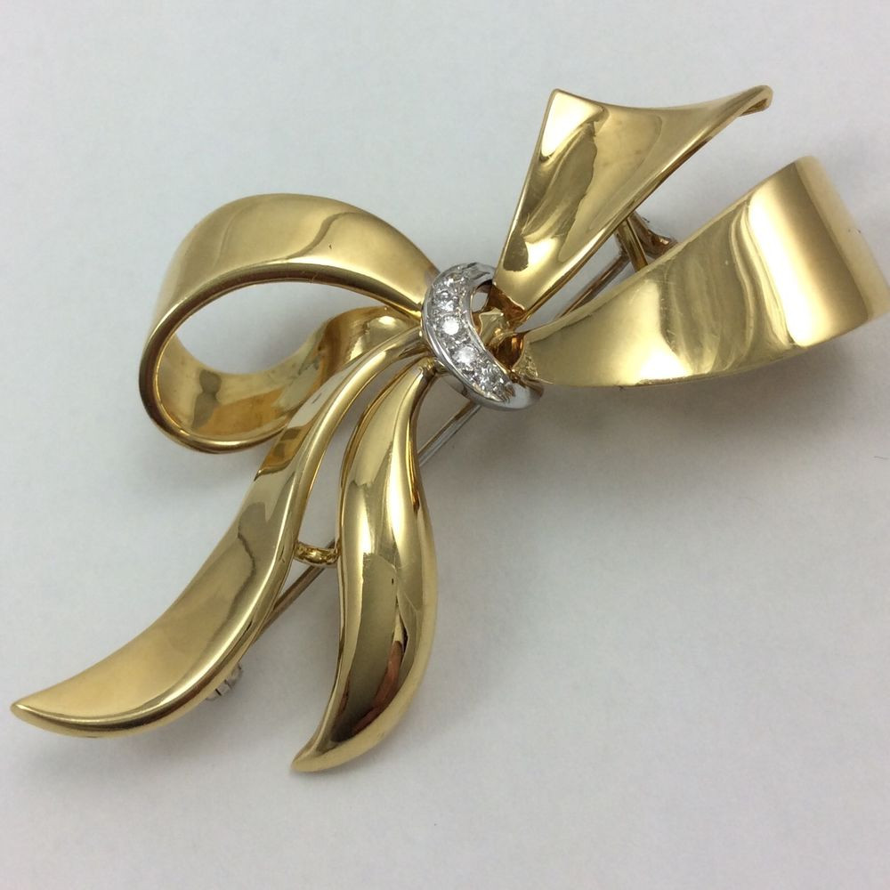 Gold Brooches
 18K YELLOW GOLD DIAMONDS BOW BROOCH PIN
