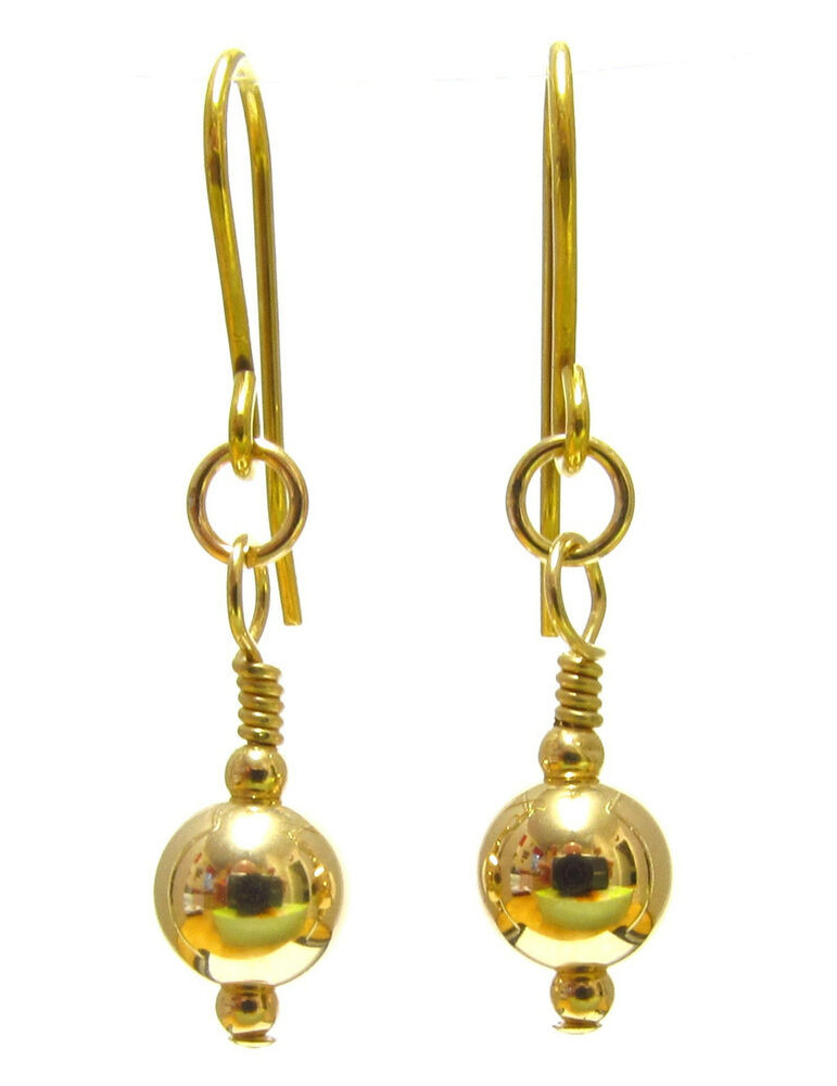 Gold Drop Earrings
 9ct Gold Drop Earrings with Sparkling 7 mm Gold Ball Beads