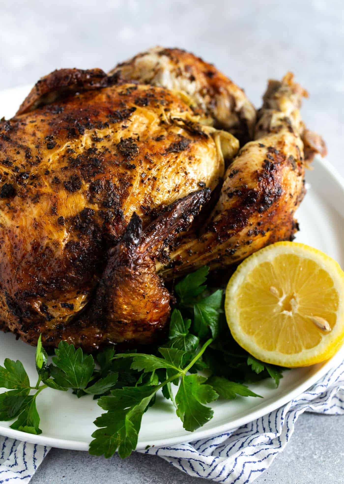 Grilling A Whole Chicken
 How to Grill a Whole Chicken Garnish with Lemon