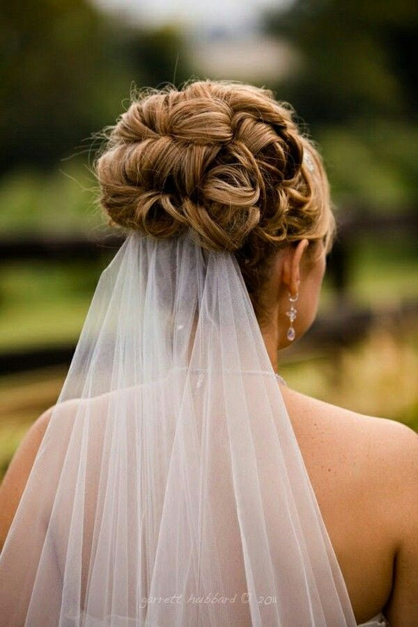 Hairstyles For Brides With Veils
 Wedding updo with veil underneath wedding hair