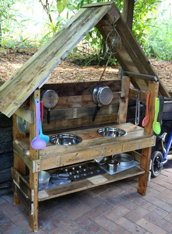 Kids Outdoor Kitchen
 Mud Kitchen made from wood with a roof