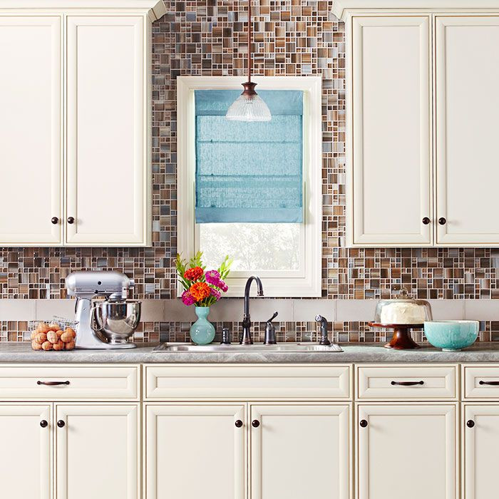 Kitchen Backsplash Around Windows
 Cream color cabinet vignette tile backsplash to ceiling