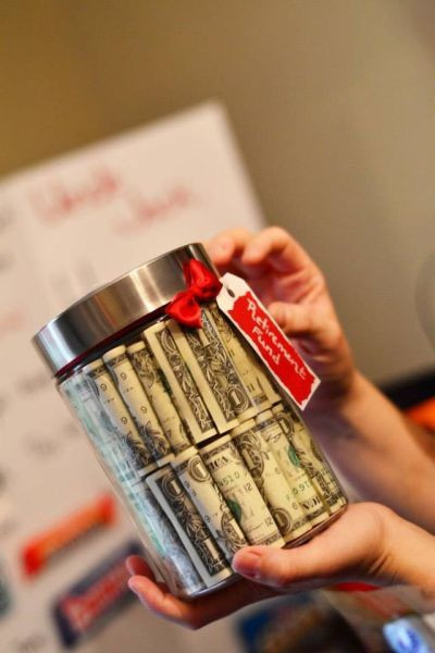 Men Birthday Gift Ideas
 Fifty one dollars bills rolled up and stacked inside a
