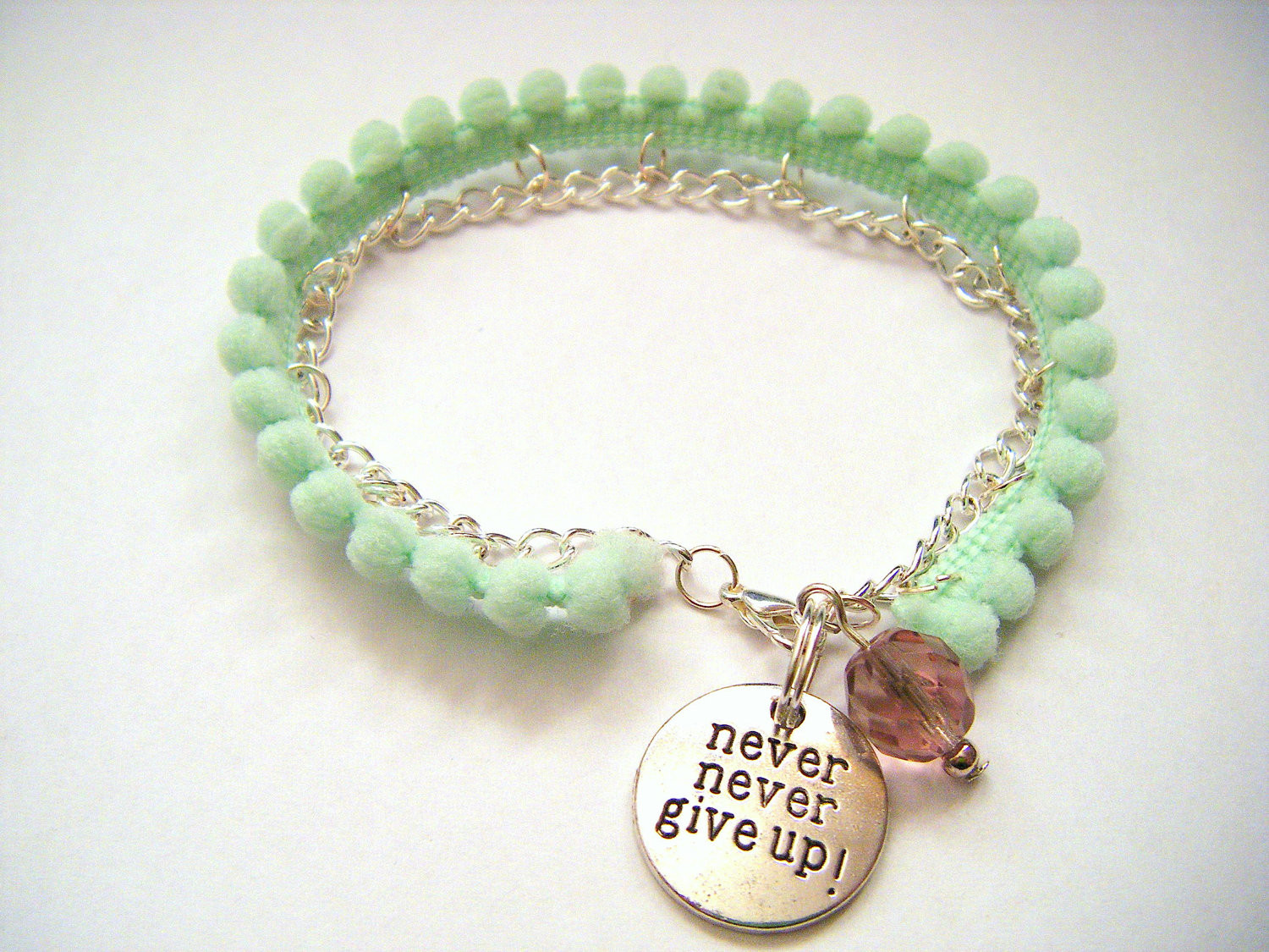 Mental Health Bracelet
 Items similar to Mint Green Pom Pom never never give up