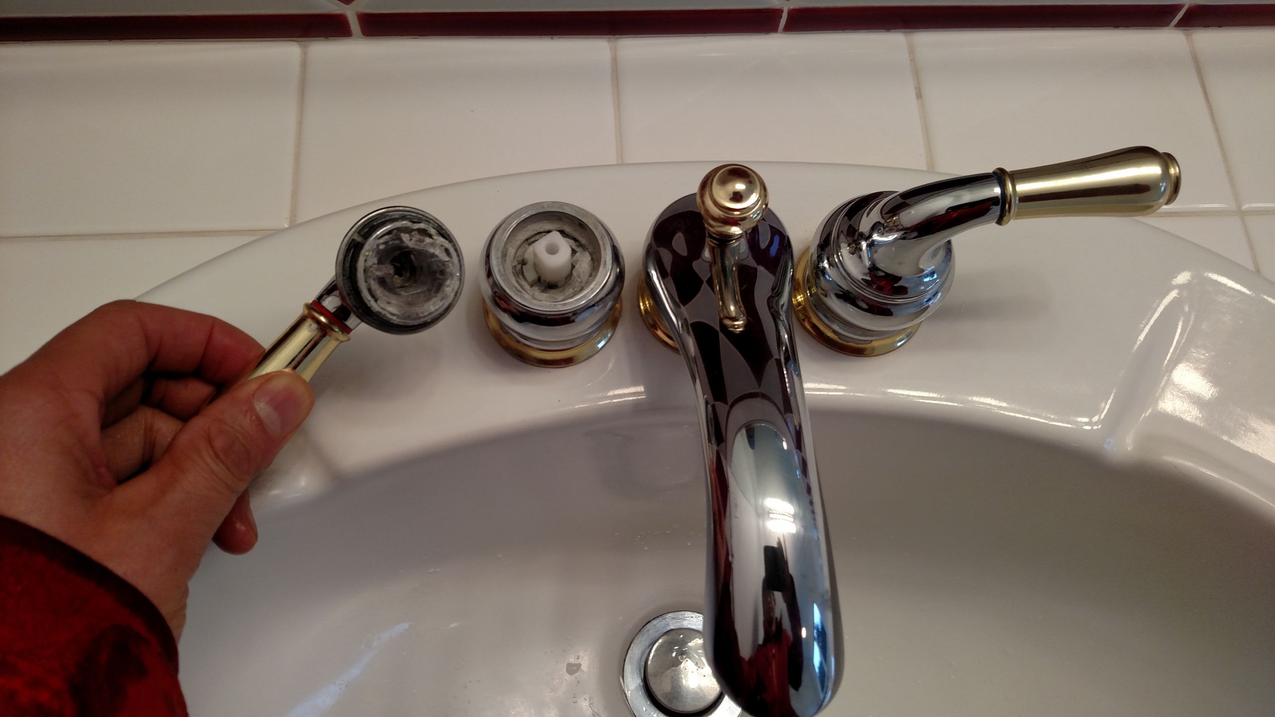 can't remove bathroom sink faucet handles