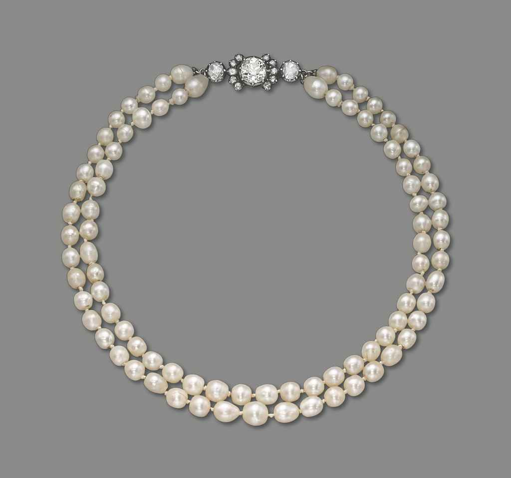 Natural Pearl Necklace
 AN ANTIQUE NATURAL PEARL CULTURED PEARL AND DIAMOND