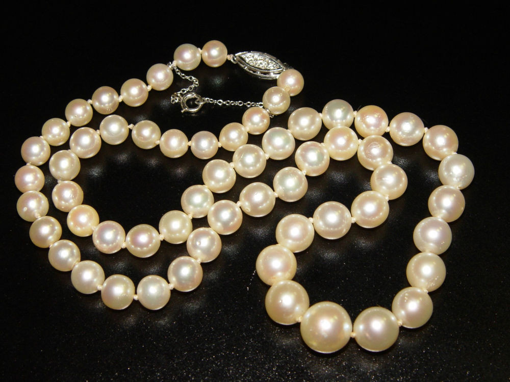 Natural Pearl Necklace
 Vintage Graduated Natural Pearl Necklace 18" with Diamond