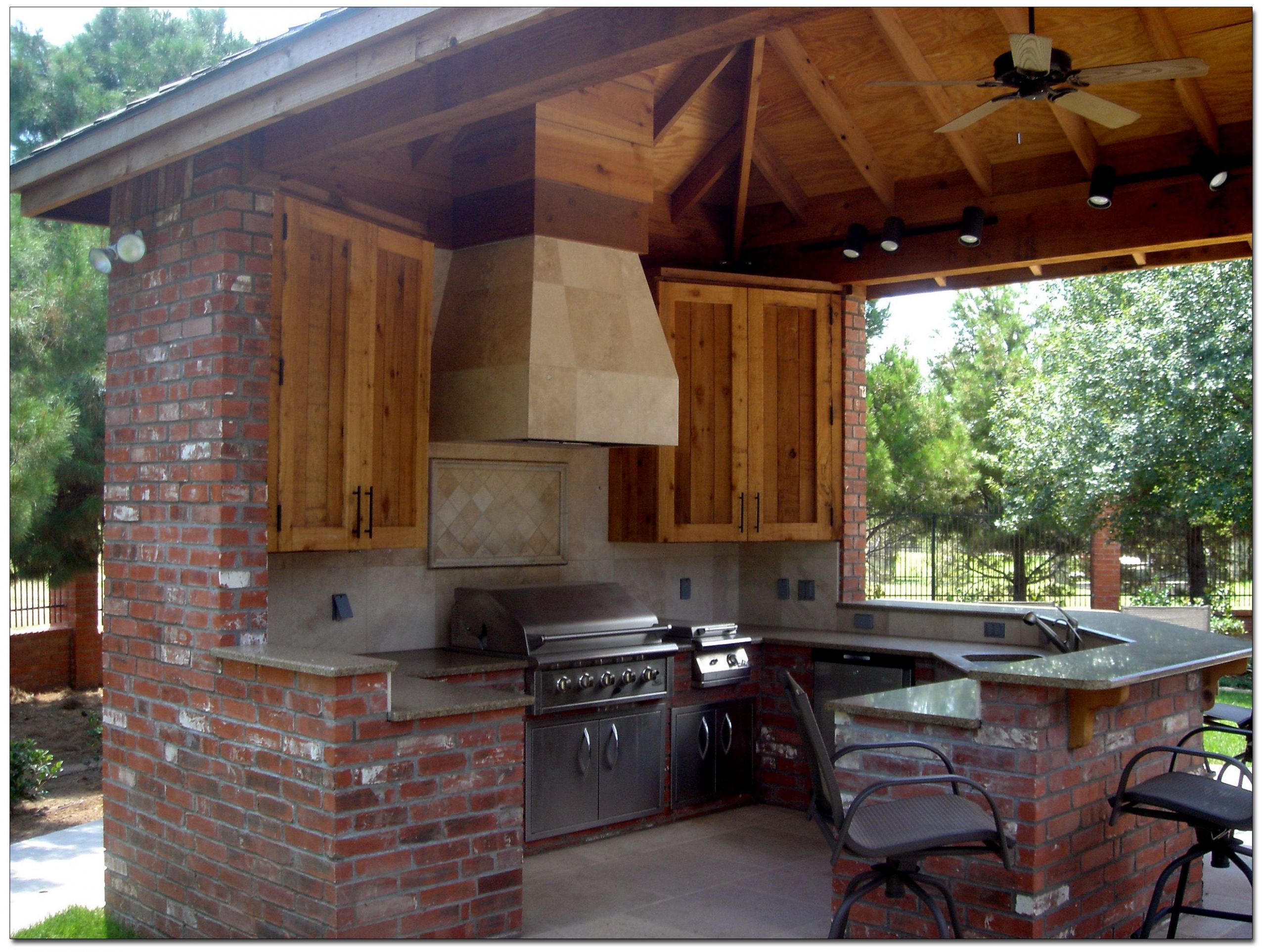Outdoor Kitchen Cabinet Plans
 What if the tv s were in the cabinets That way they would