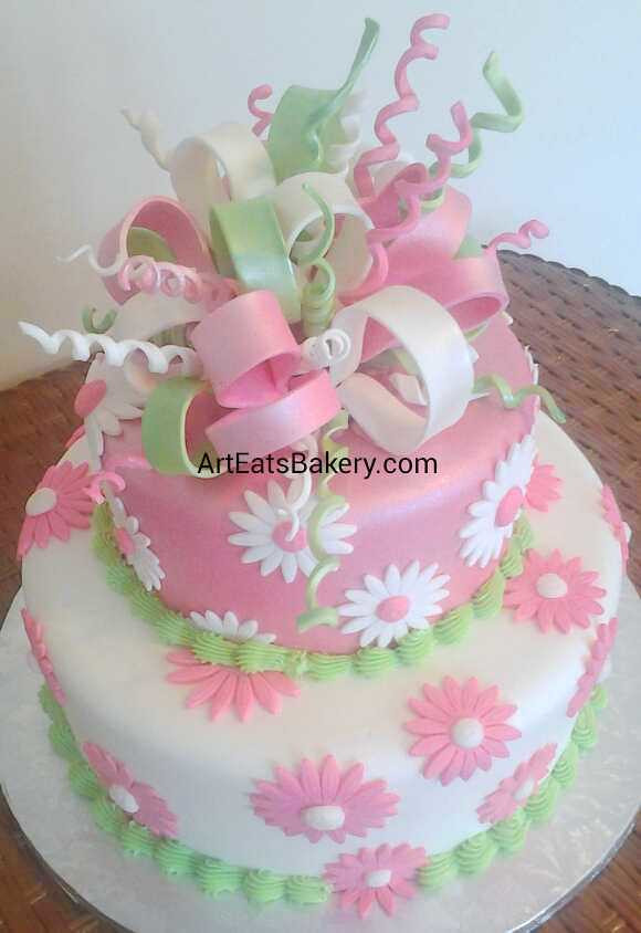 Pink And Green Birthday Cake
 Girl s pink white and green daisy flowers and edible ribb