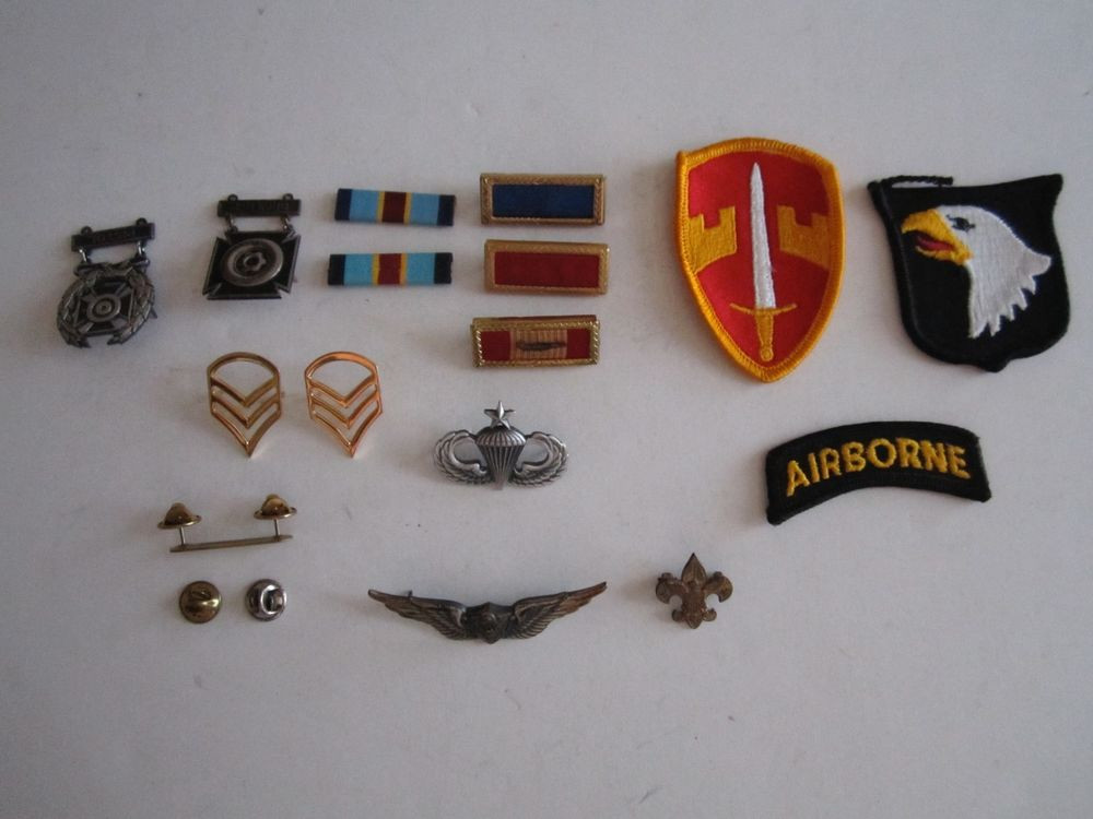 Pins And Patches
 LOT OF VINTAGE MILITARY PINS RIBBONS AND PATCHES NICE