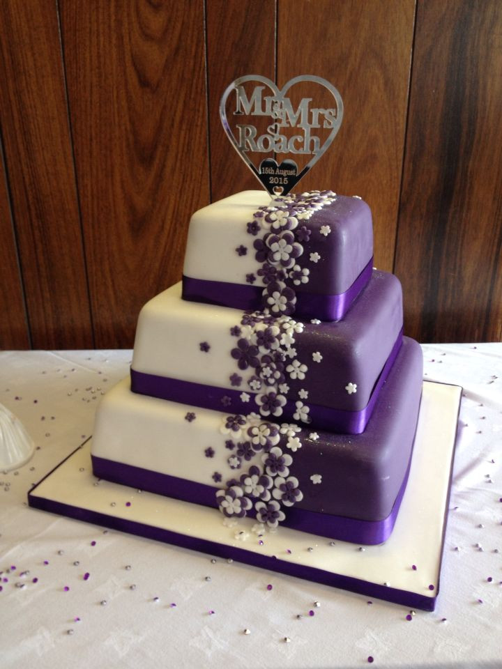 Purple And Black Wedding Cakes
 Cadbury purple wedding cake with bespoke topper