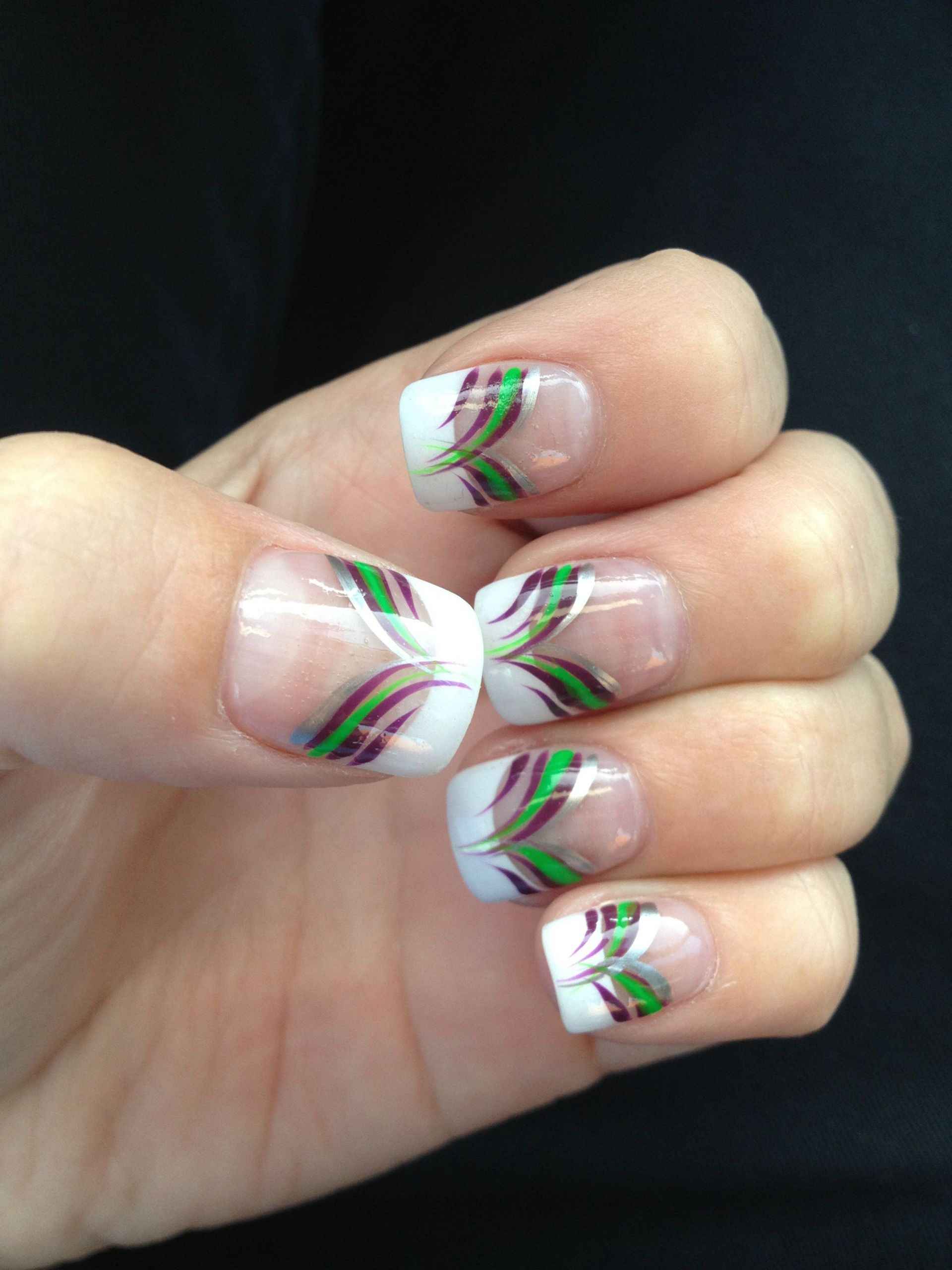 Purple And Green Nail Designs
 Joker inspired nails green and purple